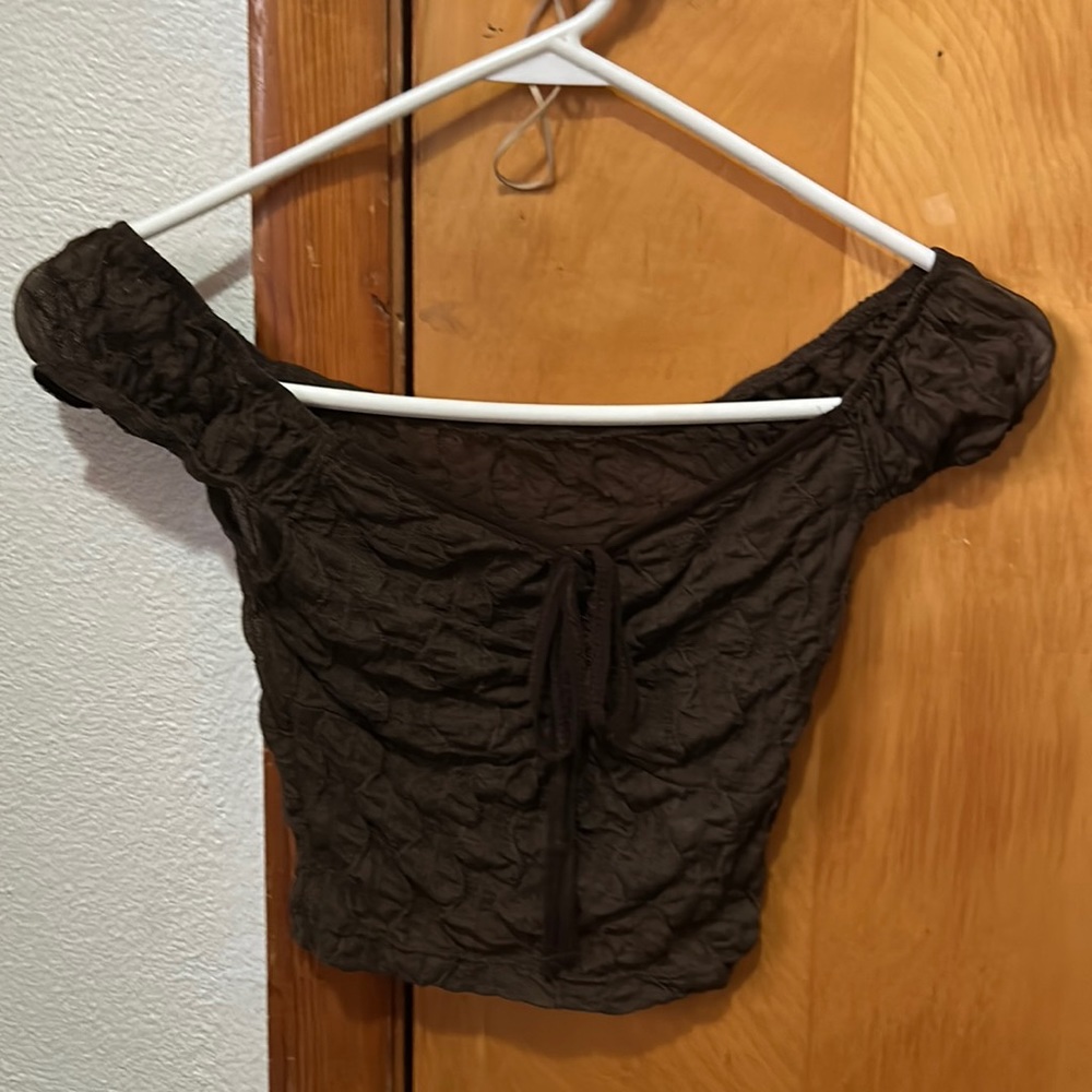 Brown crop top with a tie on the front